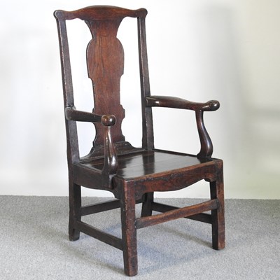 Lot 435 - An 18th century oak open armchair, on square legs