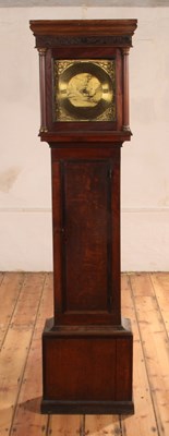 Lot 256 - A provincial oak long-case clock, circa 1800,...