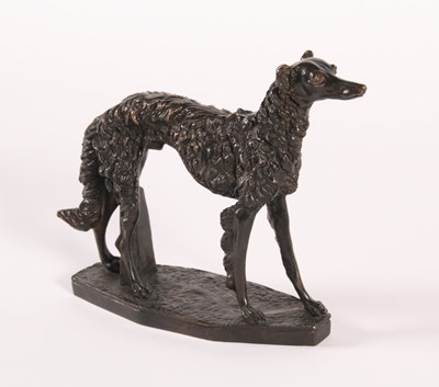 Lot 276 - A bronze model of a deerhound dog, shown in...