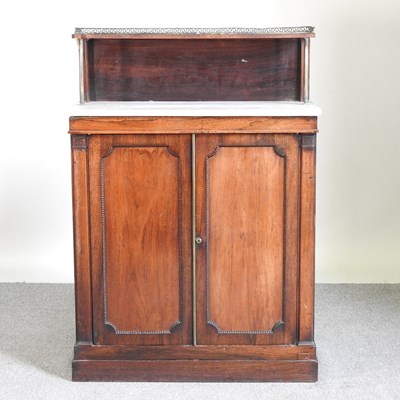 Lot 180 - A 19th century marble top chiffonier, on a...