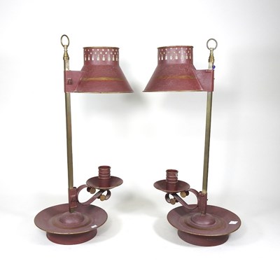 Lot 99 - A pair of red toleware candle lamps, 50cm high...