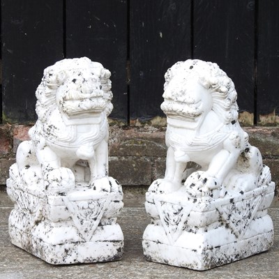 Lot 13 - A pair of carved marble garden sculptures of...