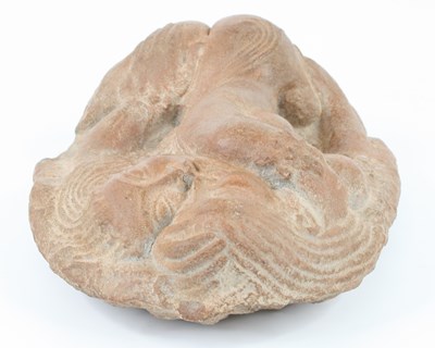 Lot 21 - An Indian terracotta relief of lovers, appears...