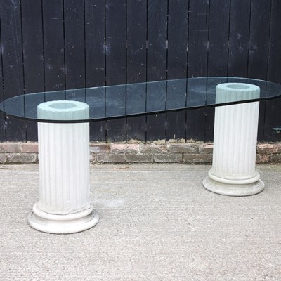 Lot 254 - A contemporary glass top dining/garden table,...