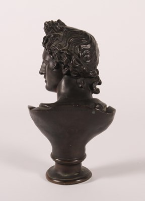 Lot 8 - A bronze head and shoulders bust of Apollo...