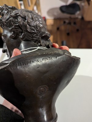 Lot 8 - A bronze head and shoulders bust of Apollo...