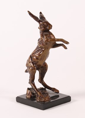 Lot 358 - A gilt metal model of a hare, 20th century,...