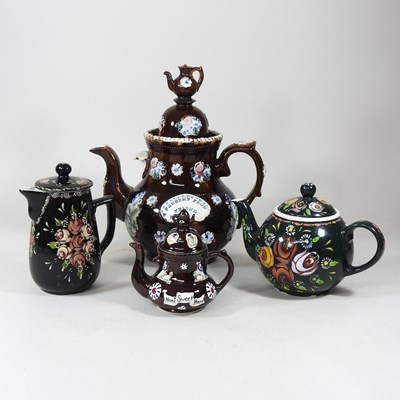 Lot 201 - A large Derbyshire bargeware teapot and cover,...