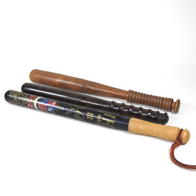 Lot 587 - A policeman's wooden truncheon, painted with a...