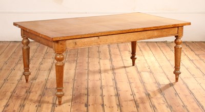 Lot 224 - A pine farmhouse kitchen table, having a later...