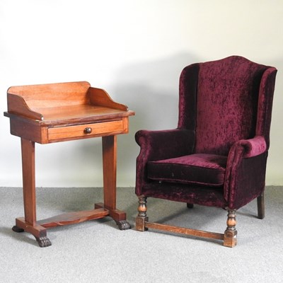 Lot 365 - An early 20th century maroon upholstered wing...