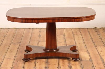 Lot 522 - A mahogany tilt-top pedestal dining table,...