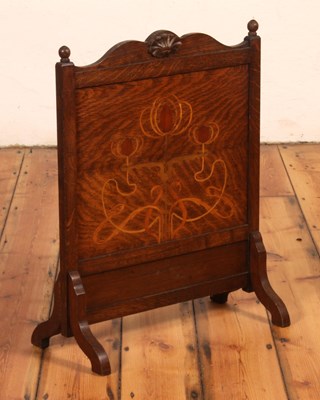 Lot 315 - An Art Nouveau oak fire screen, early 20th...