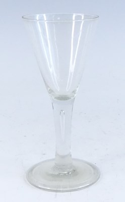 Lot 534 - A wine glass, circa 1750, the round funnel...