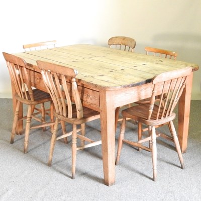 Lot 393 - An early 20th century rustic pine dining table,...