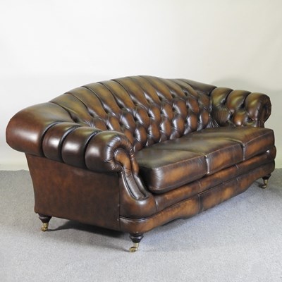 Lot 62 - A Thomas Lloyd chocolate brown leather...