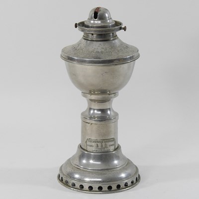 Lot 154 - A mid 20th century metal patent clockwork oil lamp base