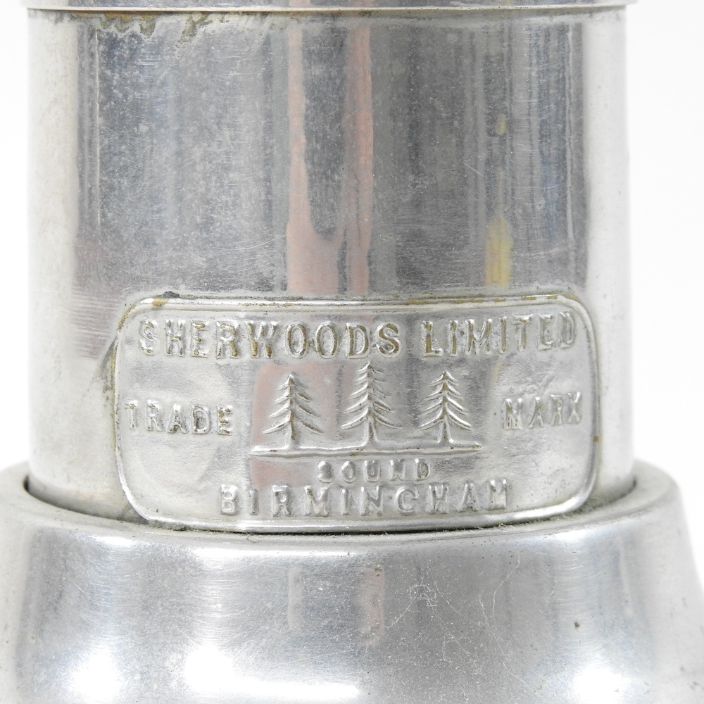 Lot 154 A mid 20th century metal patent clockwork