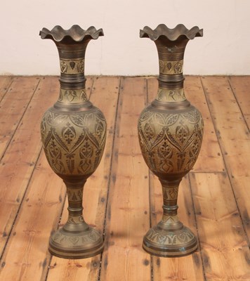 Lot 352 - A pair of large Indian brass vases, each...