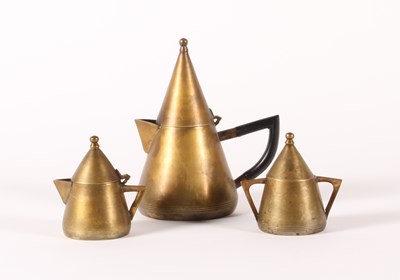 Lot 33 - An Art Deco brass three piece tea set, 1930s,...