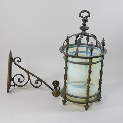 Lot 188 - An Arts and Crafts brass hanging lantern