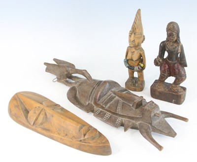 Lot 490 - An African carved wood ancestor figure,...