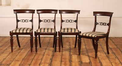 Lot 386 - A set of four rosewood bar back dining chairs,...