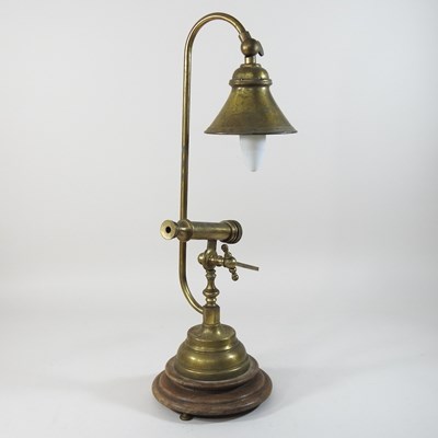 Lot 144 - A 20th century brass reading lamp