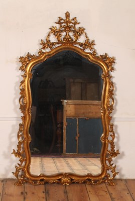 Lot 383 - A Rococo style gilt framed wall mirror, 20th...