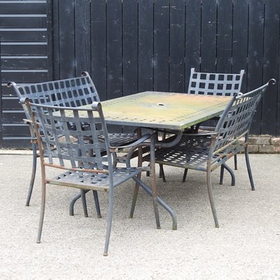 Lot 396 - A rustic metal garden table, together with two...