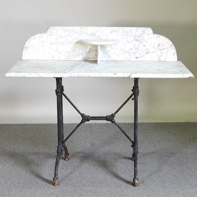 Lot 433 - An early 20th century marble top wash stand,...