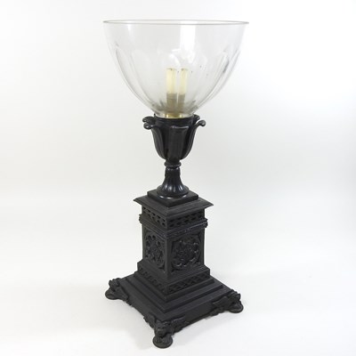 Lot 143 - A 19th century patinated bronze candle lamp