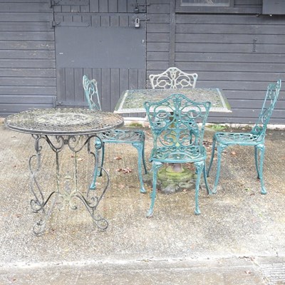 Lot 23 - A green painted cast iron garden table