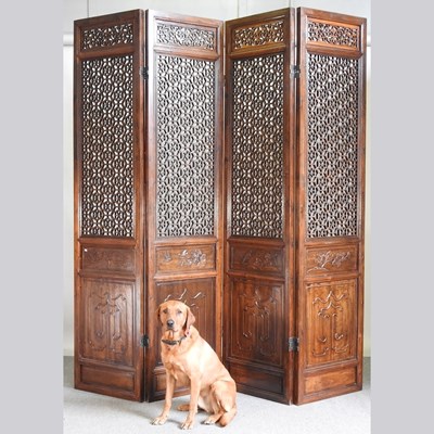 Lot 274 - An unusually large Chinese four fold screen,...