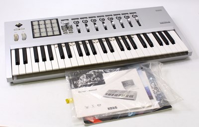 Lot 271 - A Korg Kontrol 49 Midi keyboard studio...