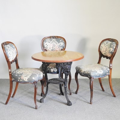 Lot 209 - A circular pub table, on a cast iron base,...