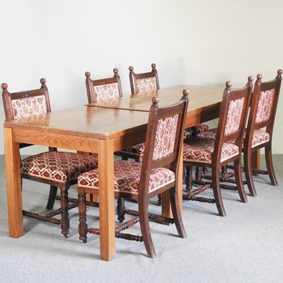 Lot 437 - A modern oak dining table, together with...
