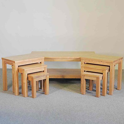 Lot 525 - A modern light oak coffee table, together with...