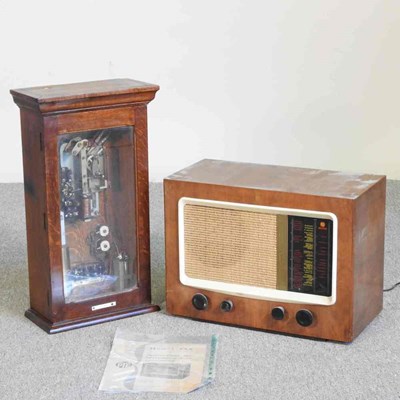 Lot 376 - An electric master clock, 55cm high together...