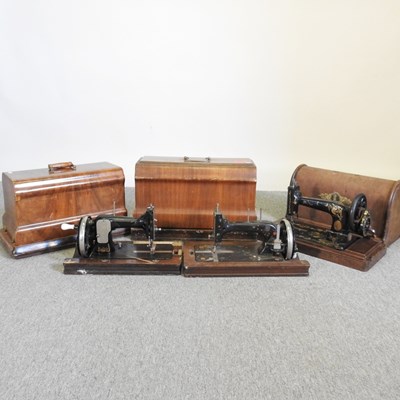 Lot 382 - A 19th century cased sewing machine, together...
