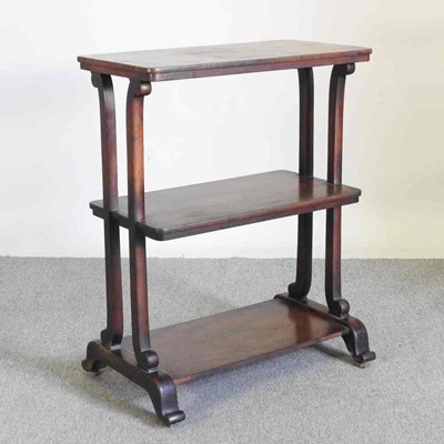 Lot 489 - A Regency rosewood three tier etagere, on...