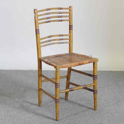 Lot 253 - A Regency painted faux bamboo bedroom chair