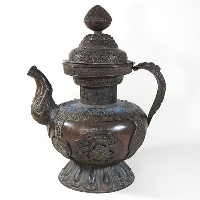 Lot 193 - A large Tibetan copper teapot and cover