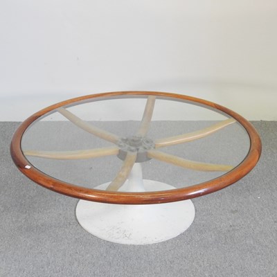 Lot 513 - A coffee table, made from a wooden ship's...
