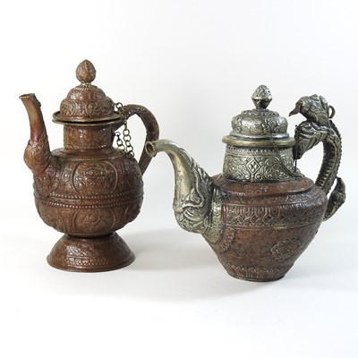 Lot 128 - An ornate Tibetan mixed metal butter teapot and cover