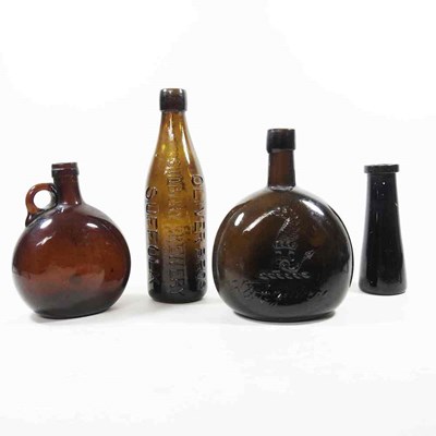 Lot 45 - A 19th century brown glass wine bottle,...