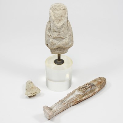 Lot 8 - An ancient Egyptian carved limestone shabti...