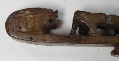 Lot 40 - A Chinese carved hardstone buckle