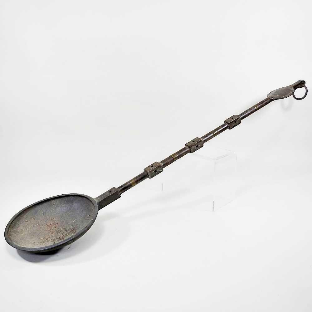Lot 119 - A large African tribal bronze ladle or scoop,...