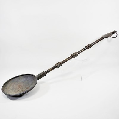 Lot 119 - A large African tribal bronze ladle or scoop,...